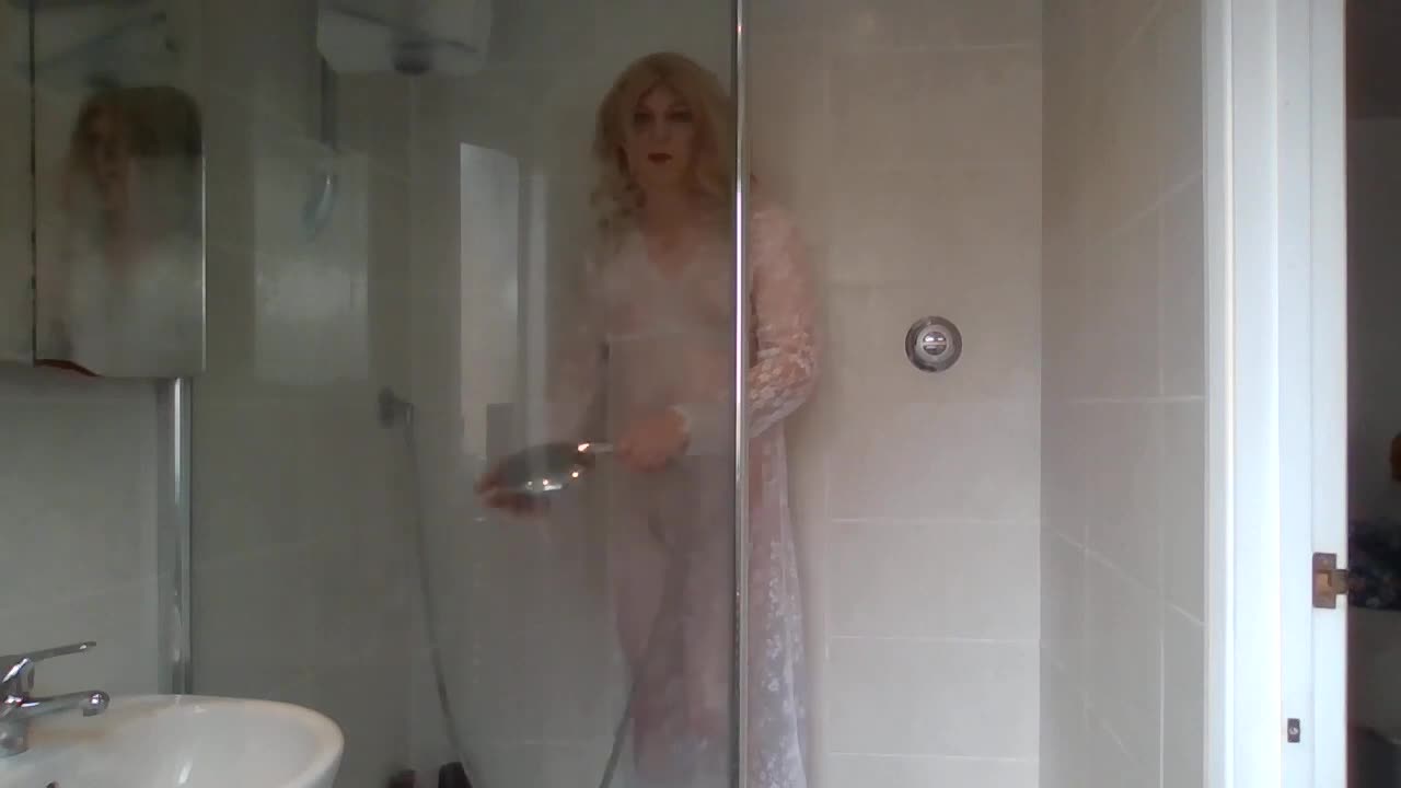 White lace dress soaked in the hot shower